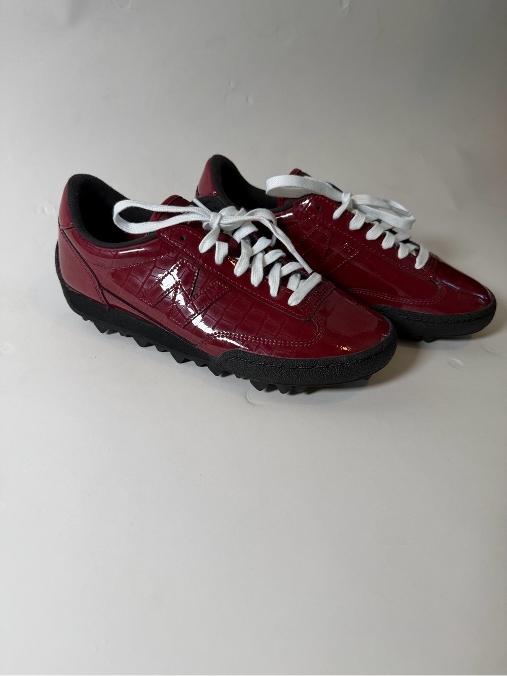 New Balance Women's Burgundy Patent Leather Sneakers with White Laces
